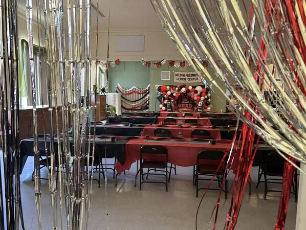 A banner reading Milton-Freewater Senior Center Tropical Bash; Saturday, April 26, 2025; 3:30 P.M. to 6:30 P.M.